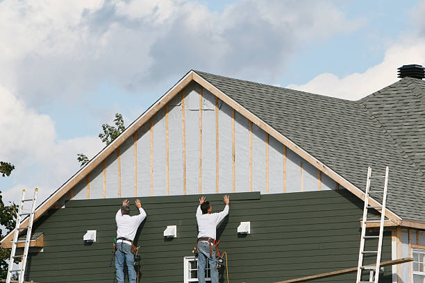 Professional Siding Installation technician working in Rockville, MD